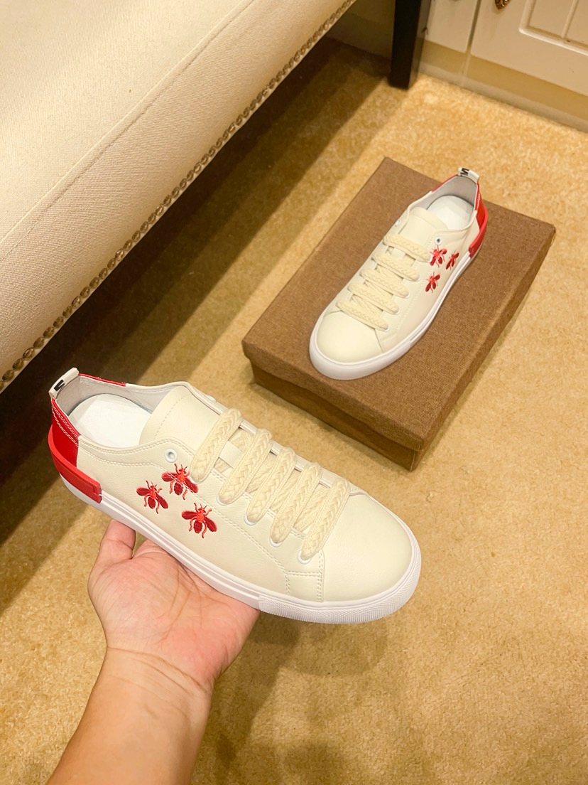White Low-Top Sneakers with Red Floral Accents