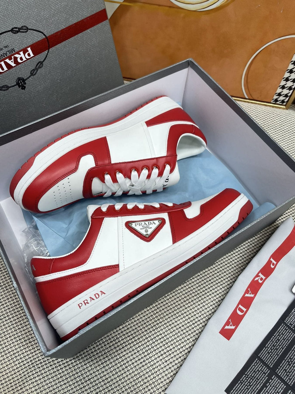 Prada Red and White Low-Top Sneakers