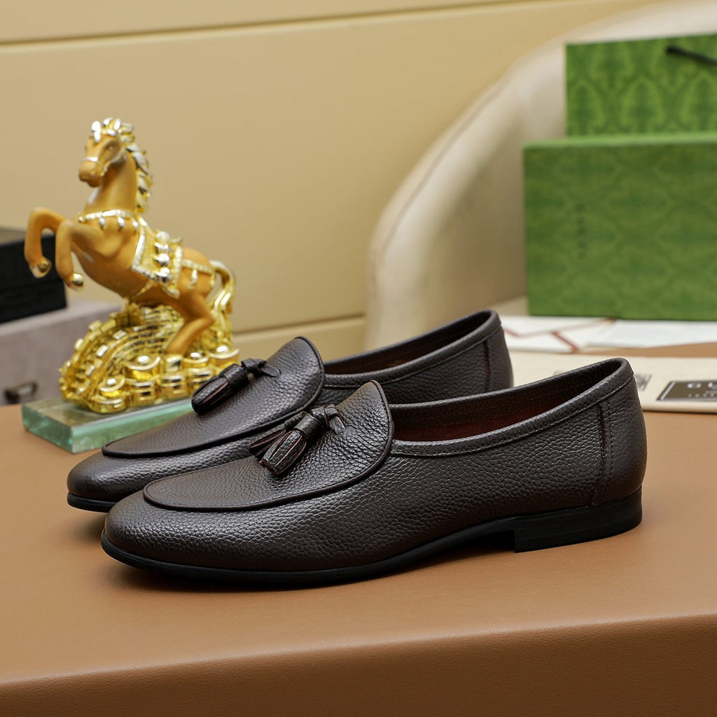 Gucci Textured Tassel Loafers